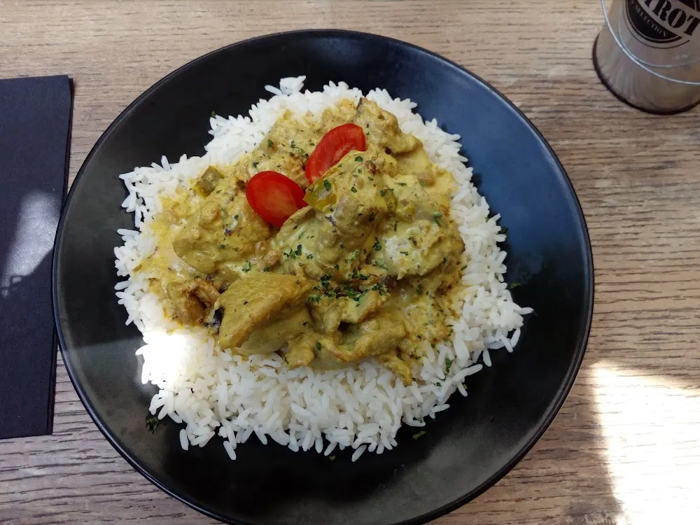 Émincé de Dindonneau Riz Au Curry